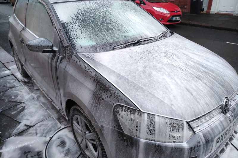 Car rinsed and then sealant applied via another foam lance.